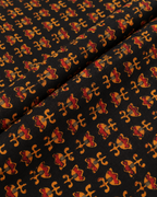 Black Fabric with Mustard & Rust Floral Motifs