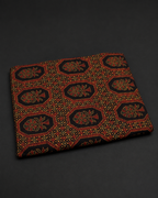Black Fabric with Rust and Ochre Floral Medallions