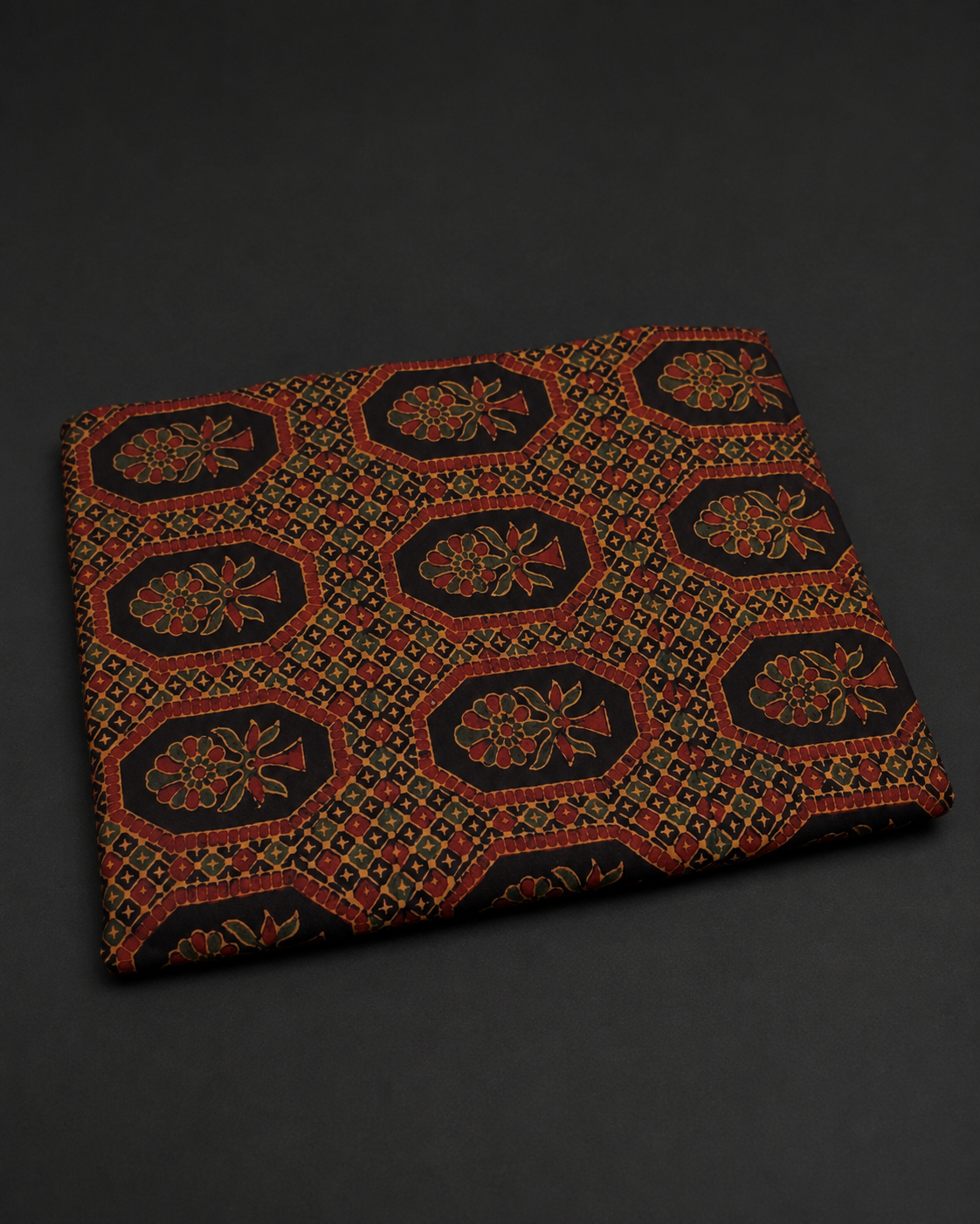 Black Fabric with Rust and Ochre Floral Medallions