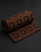 Black Fabric with Rust and Ochre Floral Medallions
