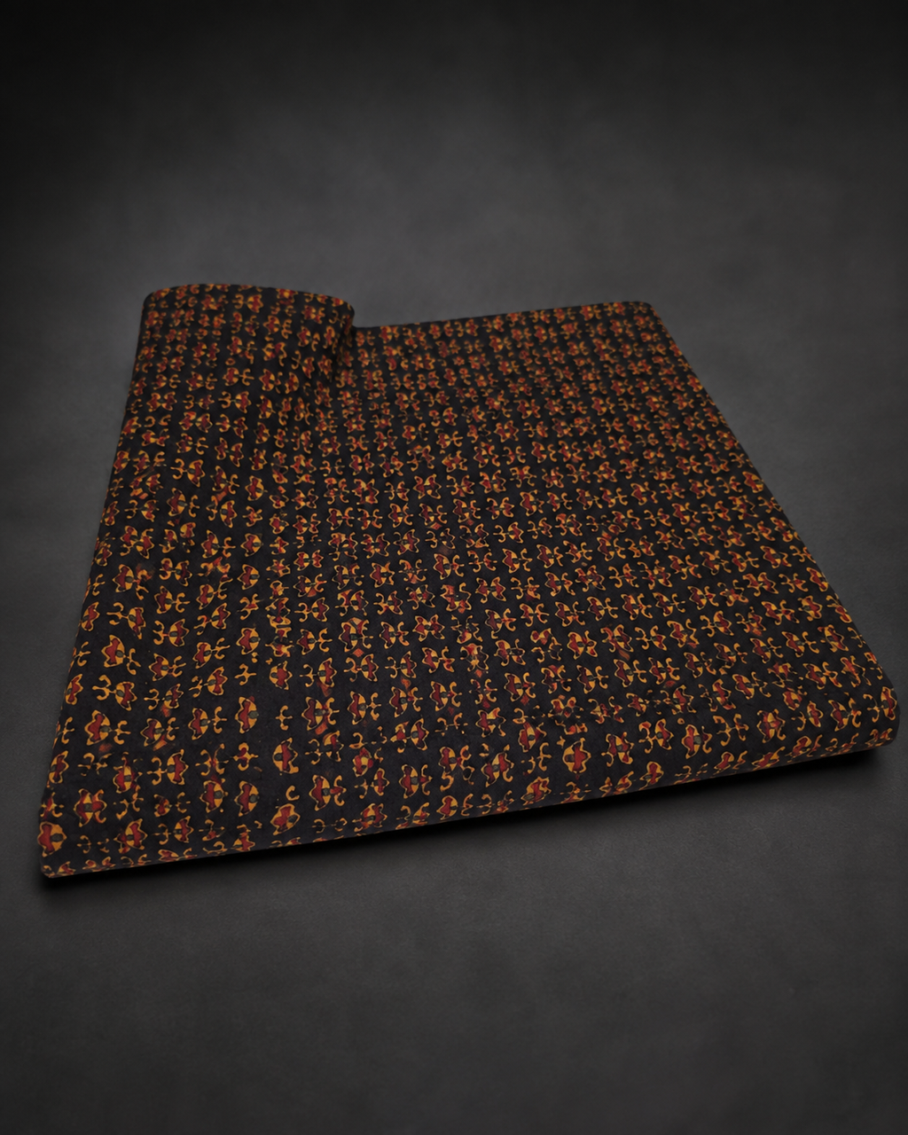 Black Fabric with Miniature Rust and Ochre Motifs