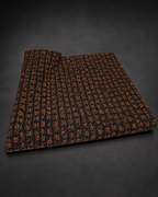 Black Fabric with Miniature Rust and Ochre Motifs